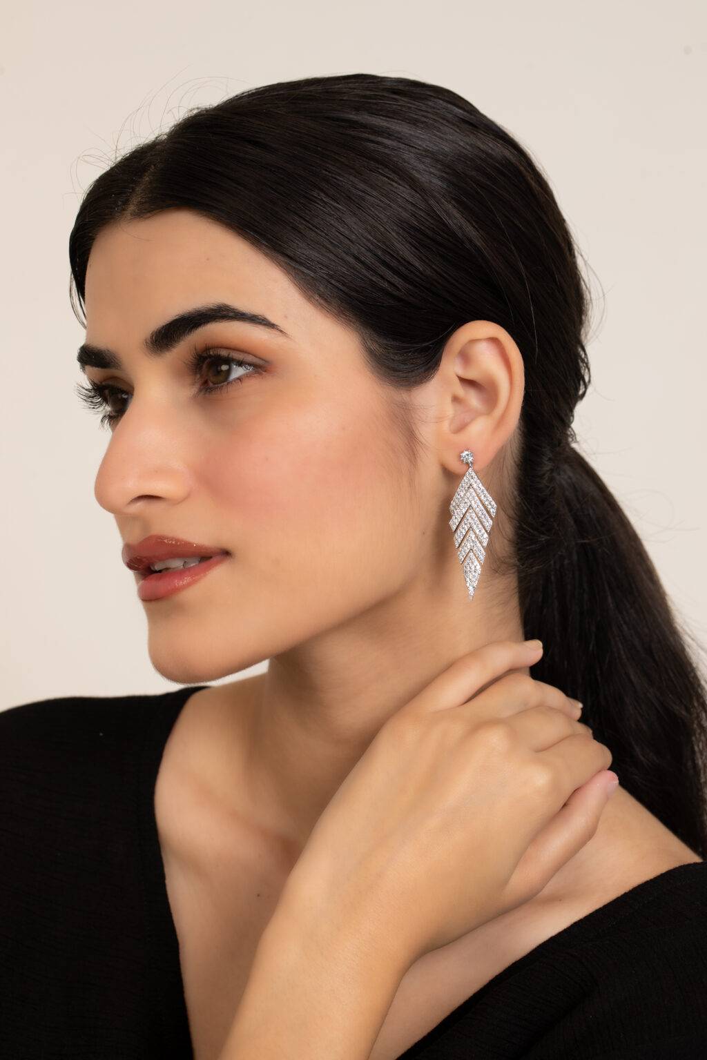 Geometric bridal drop cubic zirconia earrings for women model view